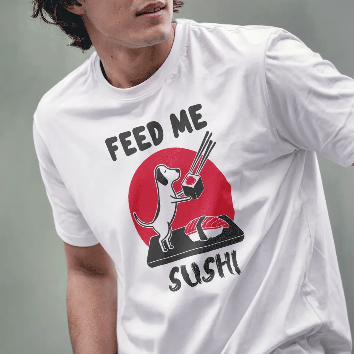 Male model wears white t-shirt with sushi dog, red circle, and “FEED ME SUSHI” text, sushi shirt, funny shirts with sayings.