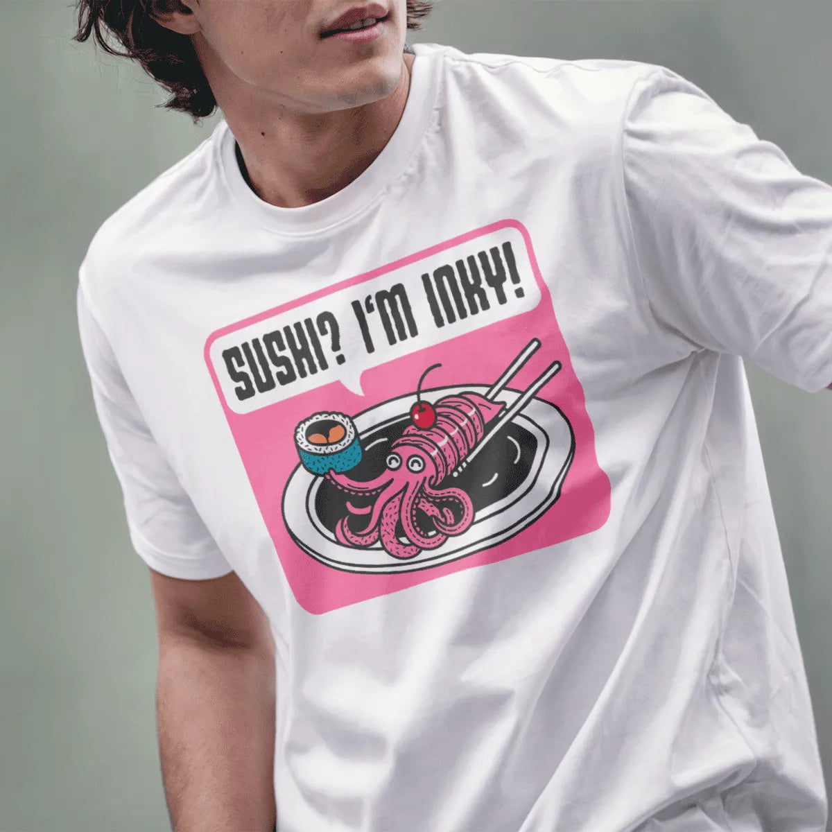 Male model wears white shirt with pink squid sushi, chopsticks, and playful quote in cartoonish style.