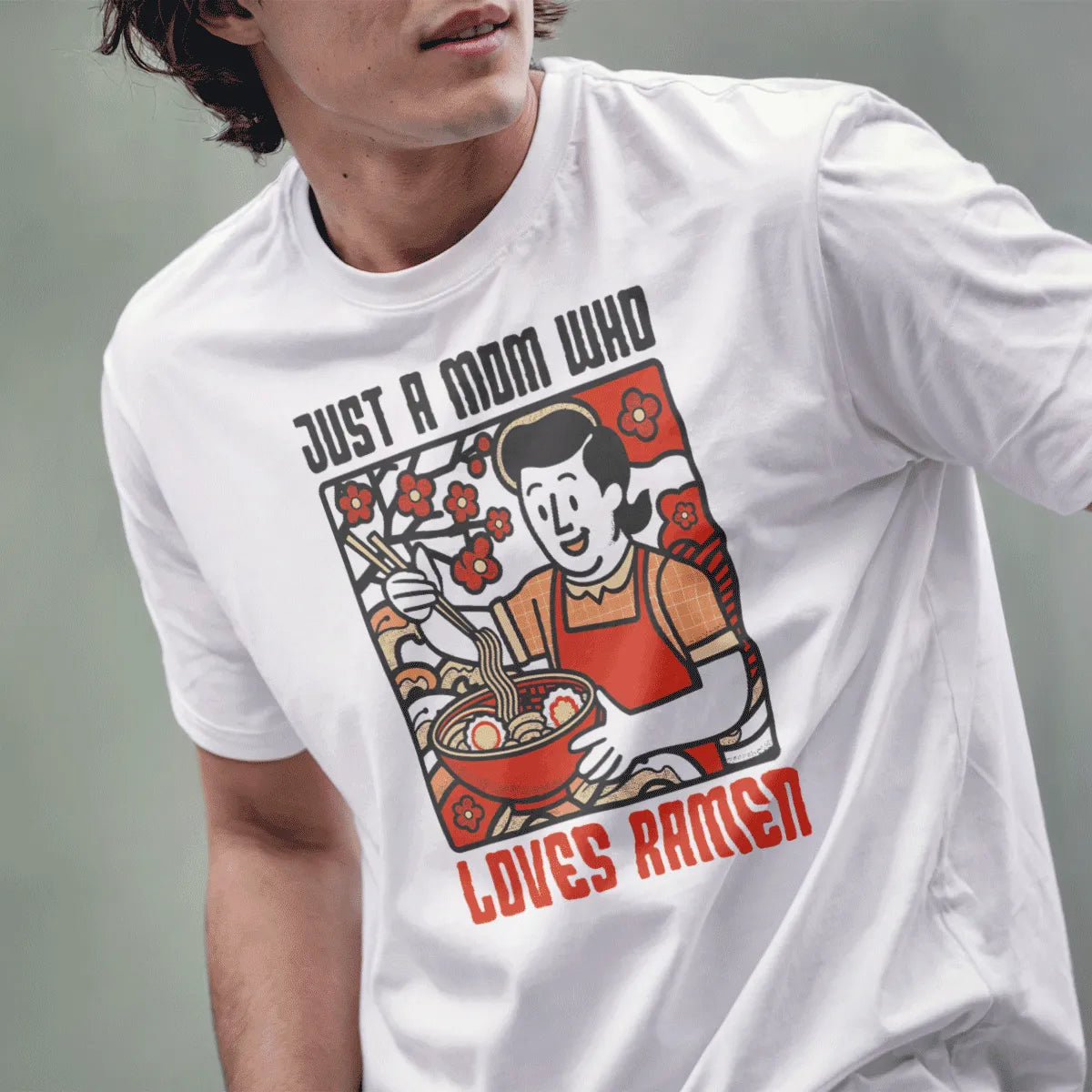 Male model in white t-shirt with happy mom, ramen bowl, and playful text; ramen t-shirt, retro design.