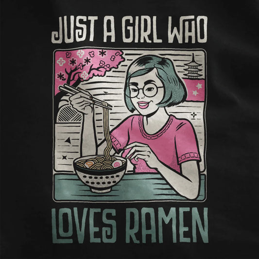 Close-up of joyful girl eating ramen with pink blossoms on black shirt; japanese t-shirts, cherry blossom design.