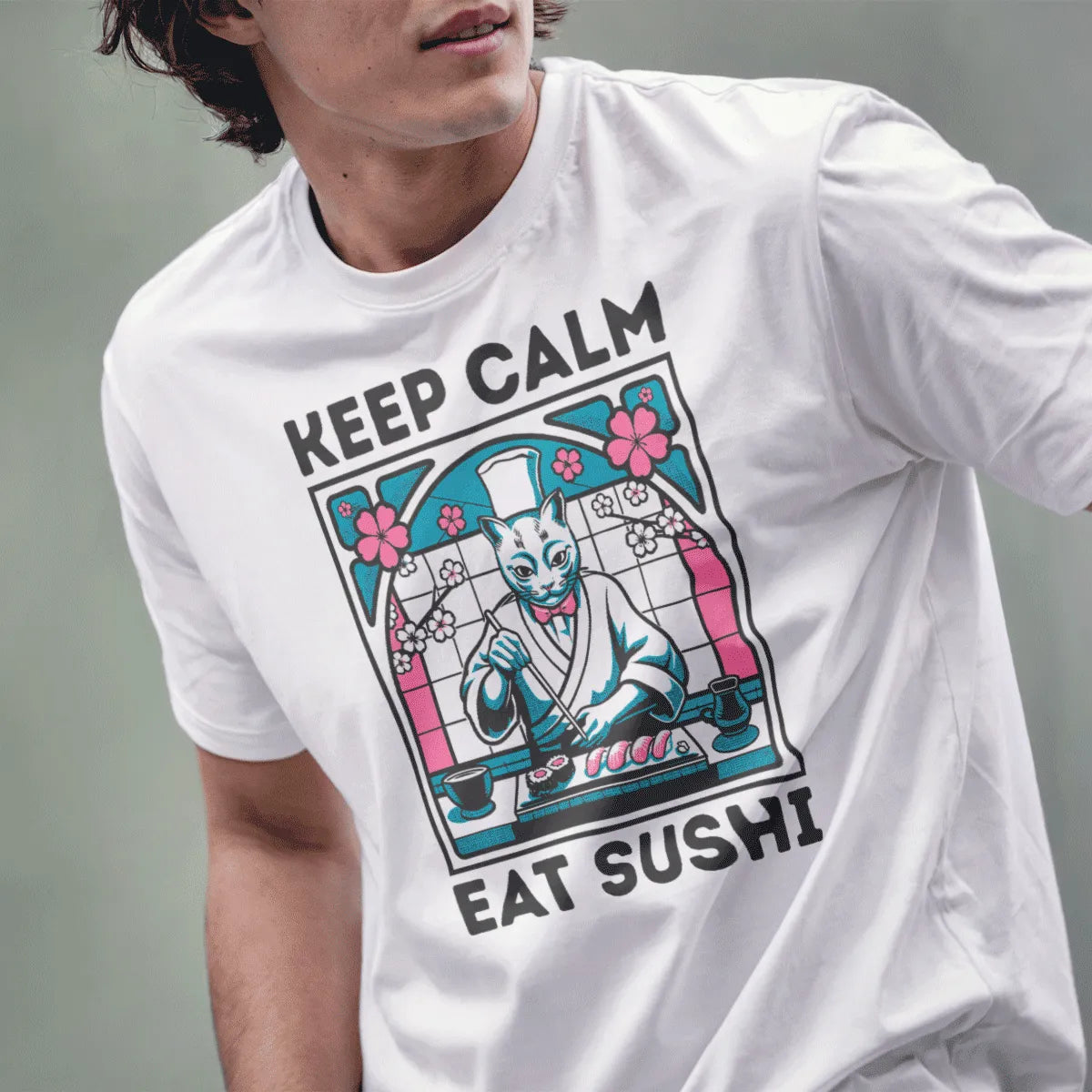 Male model wearing white sushi cat chef t-shirt with keep calm text and cherry blossoms, lower face visible.