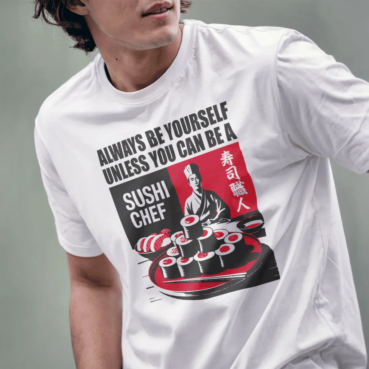 Male model in white sushi chef t-shirt, motivational text and chef graphic visible. sushi shirt, cultural pride.