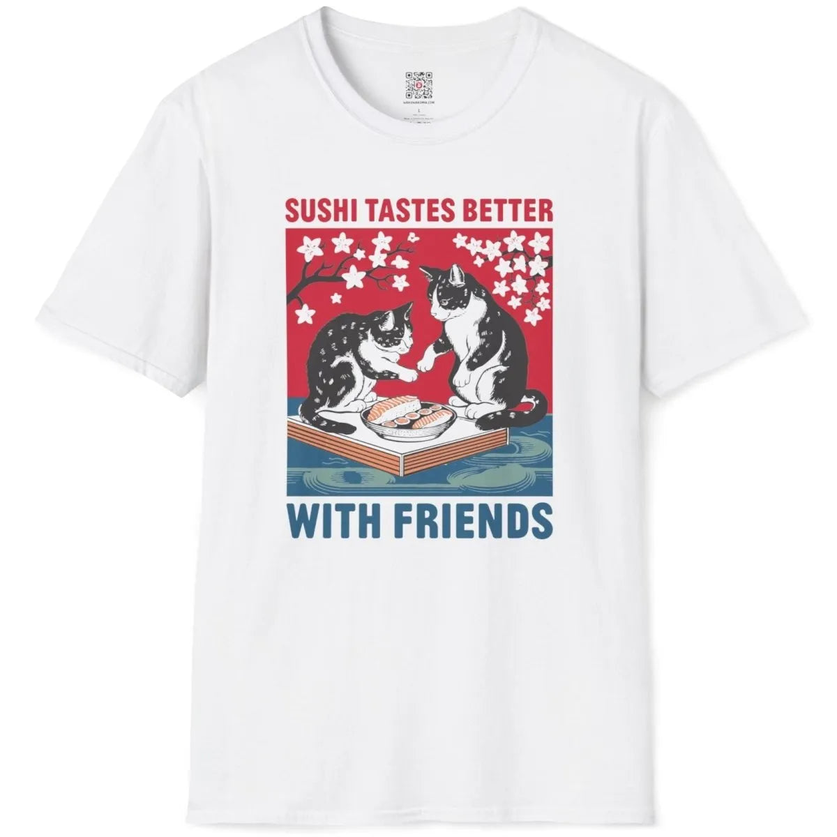 White t-shirt flatlay with playful cats eating sushi, cherry blossom design, sushi culture.