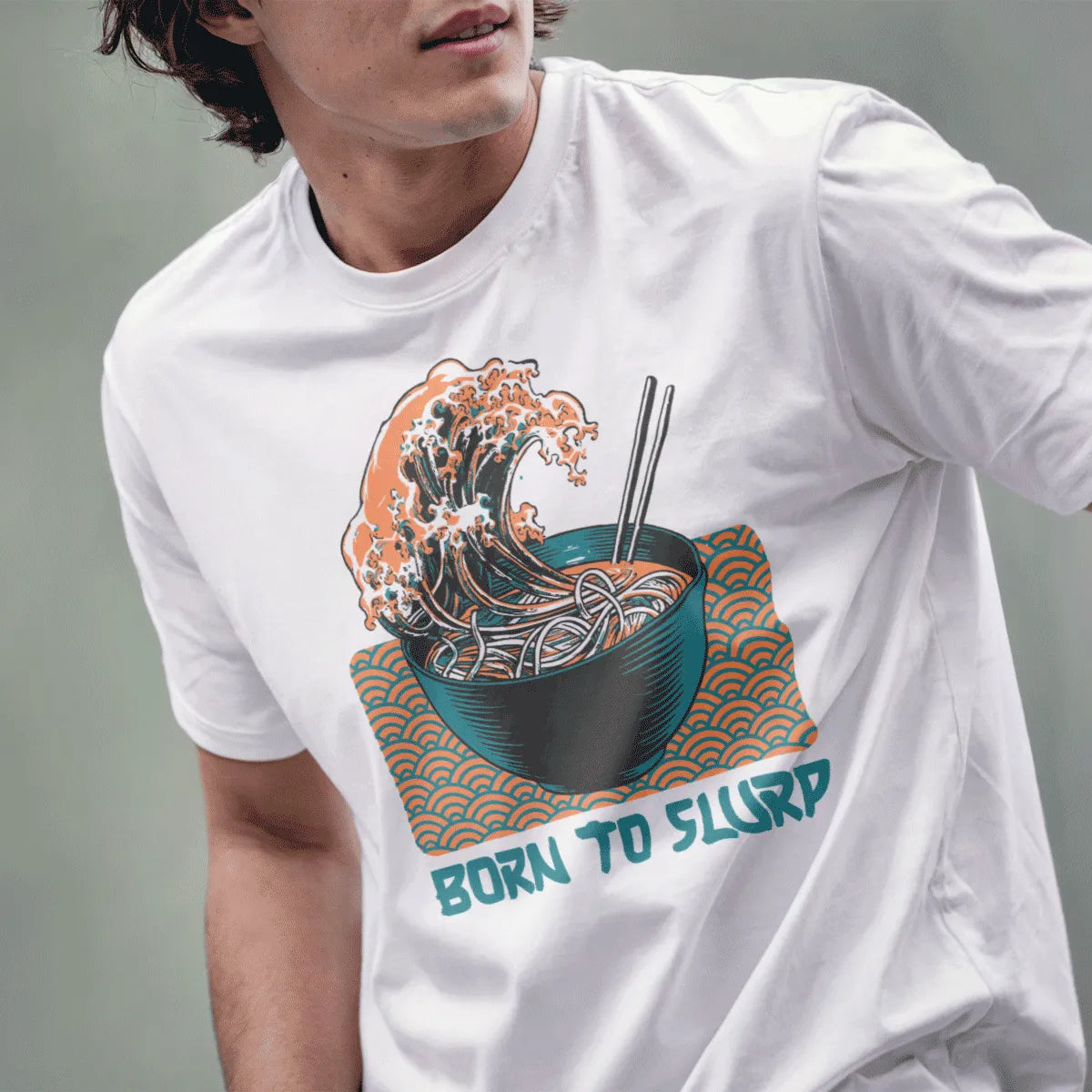 Male model in white t-shirt with playful ramen bowl and wave, hand-drawn text, japanese t-shirts.