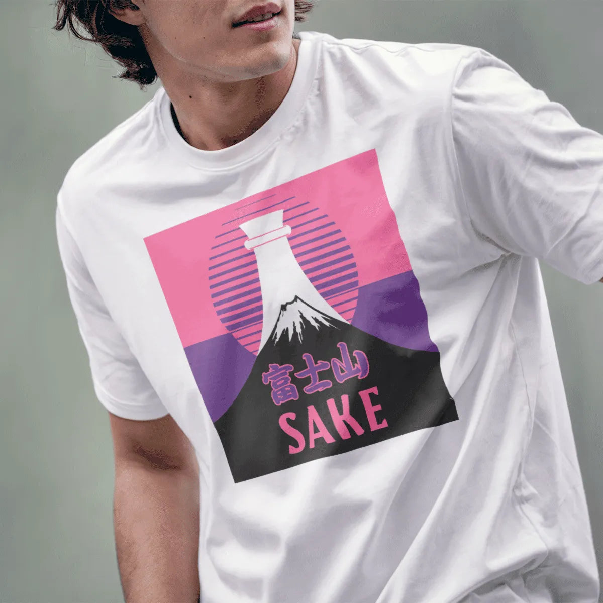 Male model in white shirt with Mount Fuji, sake bottle, pink sun, and Japanese script, modern tradition.