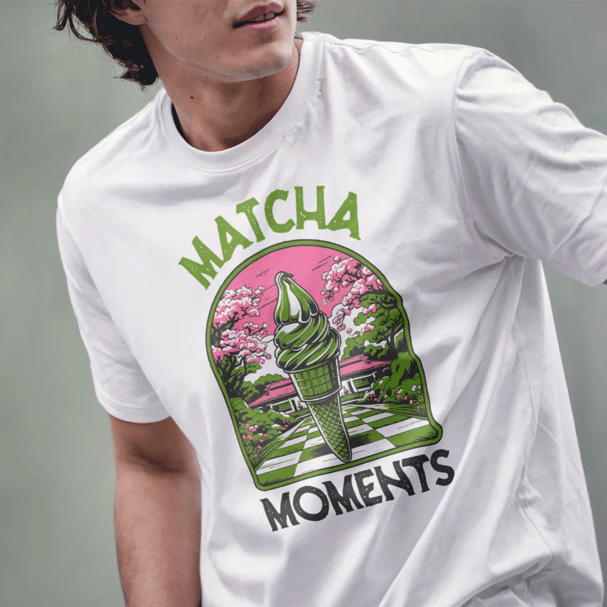 Male model in white shirt with matcha ice cream, cherry blossoms, and playful "MATCHA MOMENTS" text.