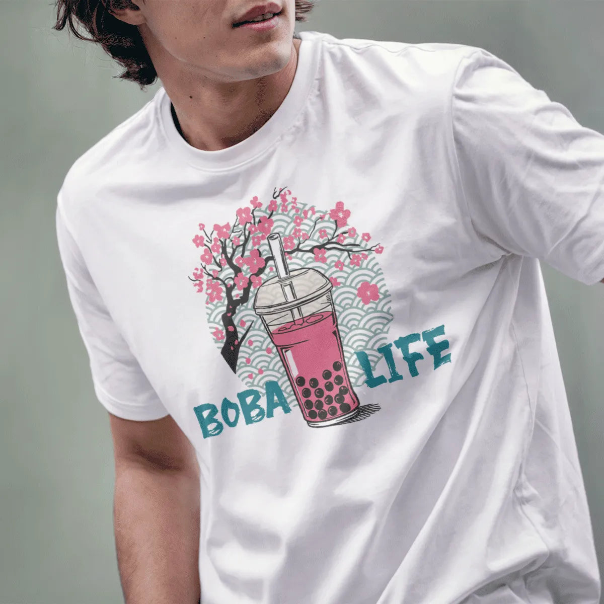 Male model in white shirt with boba tea, cherry blossoms, and wave motifs, japanese t-shirts, kawaii clothes.
