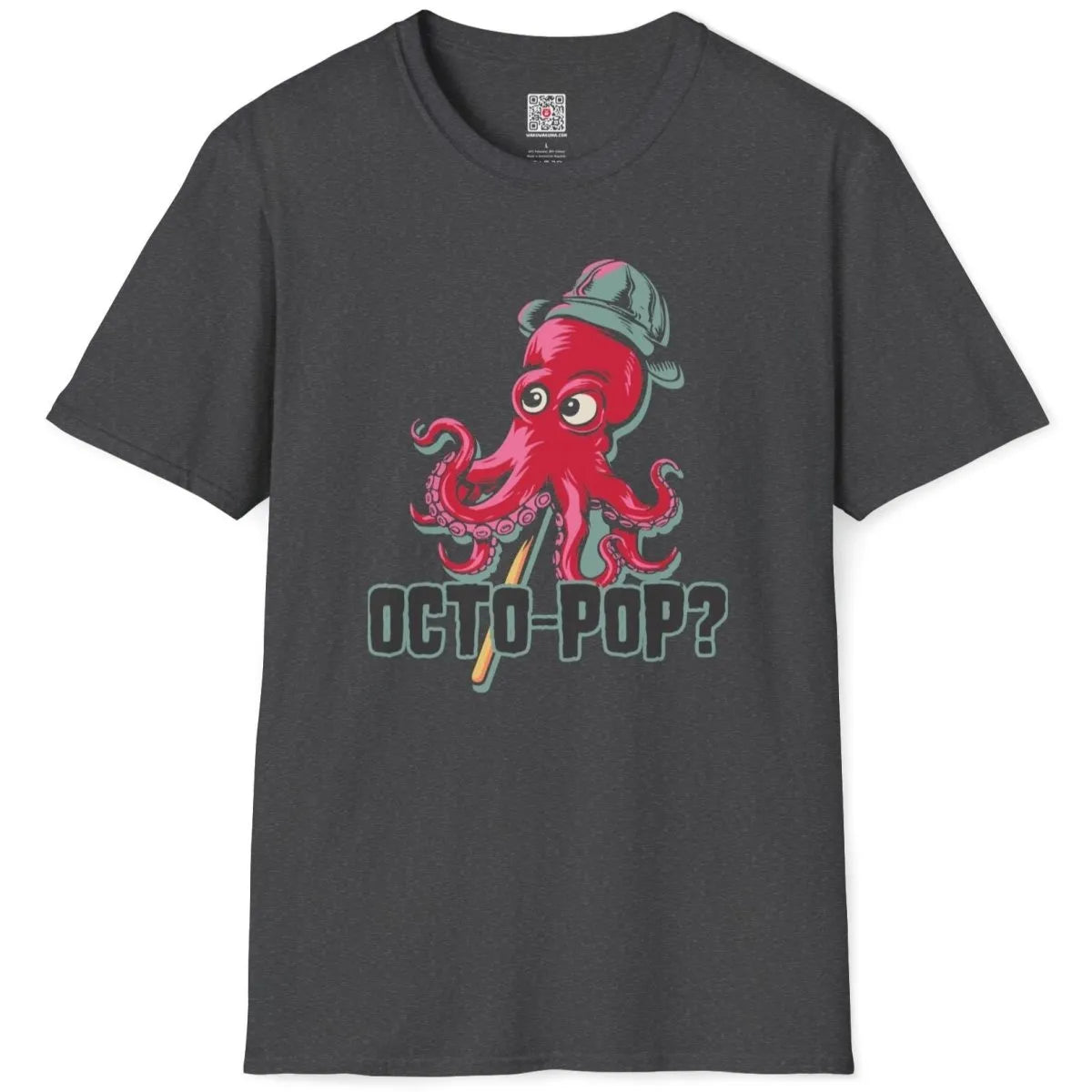 Flatlay of dark heather shirt with whimsical red octopus, gray hat, and wooden stick, dynamic composition.