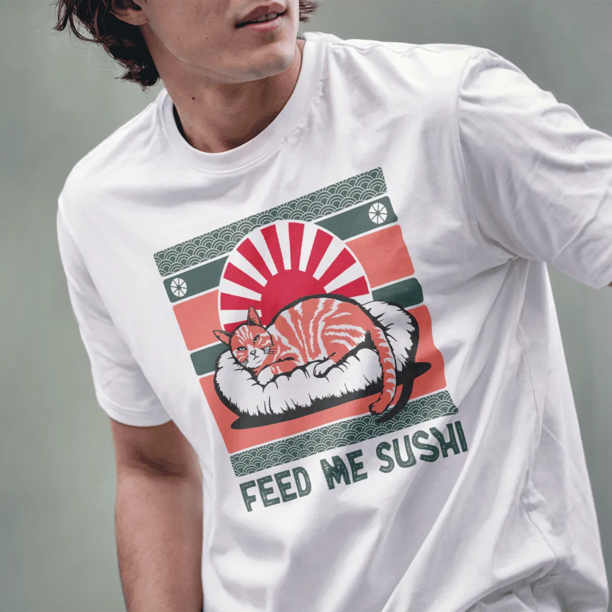 Male model in white tee with regal tabby cat on sushi roll, rising sun, and green wave motifs, japanese t-shirts.