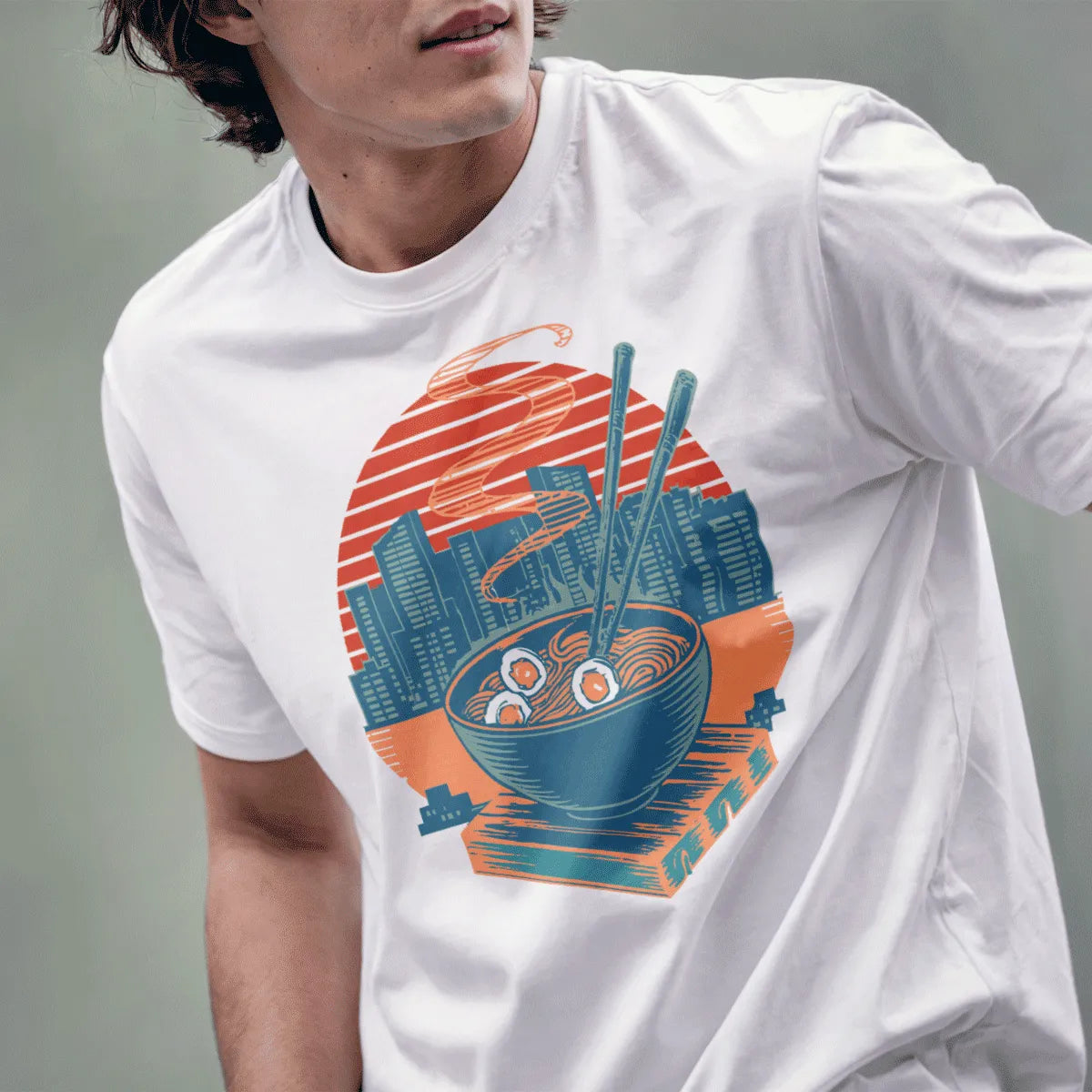 Male model in white t-shirt with ramen bowl, chopsticks, cityscape, and sun, ramen t-shirt, fusion cuisine.