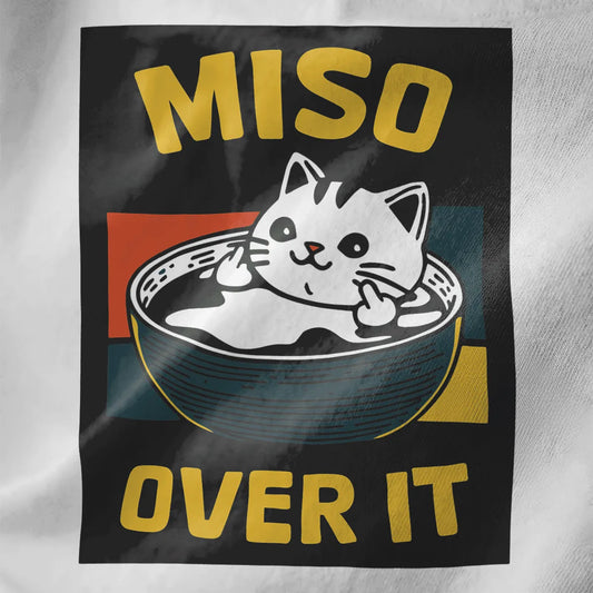 Closeup of cat in miso soup bowl, middle fingers up, white shirt, funny cat shirt, miso cat.