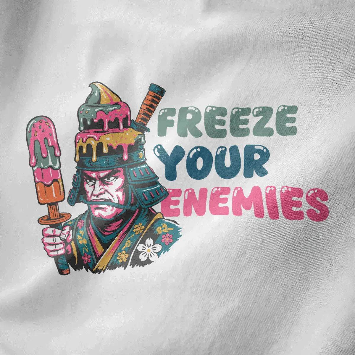 Close-up of white shirt with samurai holding ice cream, bold FREEZE YOUR ENEMIES text; japanese t-shirts, samurai fusion.