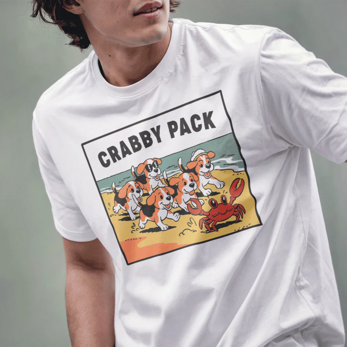 Male model in white t-shirt with beagle puppies and crab, friends themed shirts, cartoonish style.
