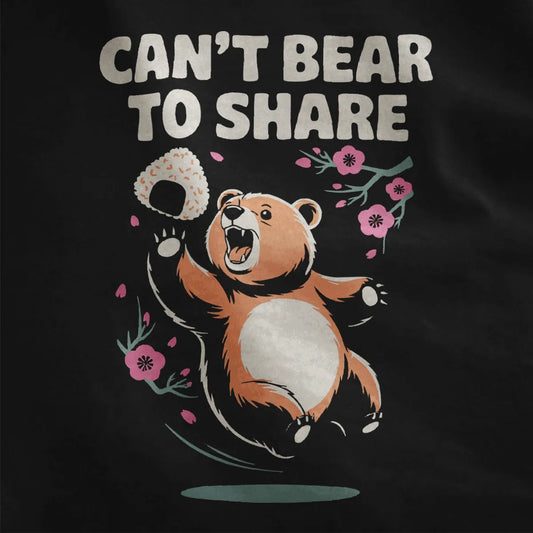 Close-up of orange bear with rice ball and cherry blossoms on black t-shirt, bear shirt, cherry blossom design.