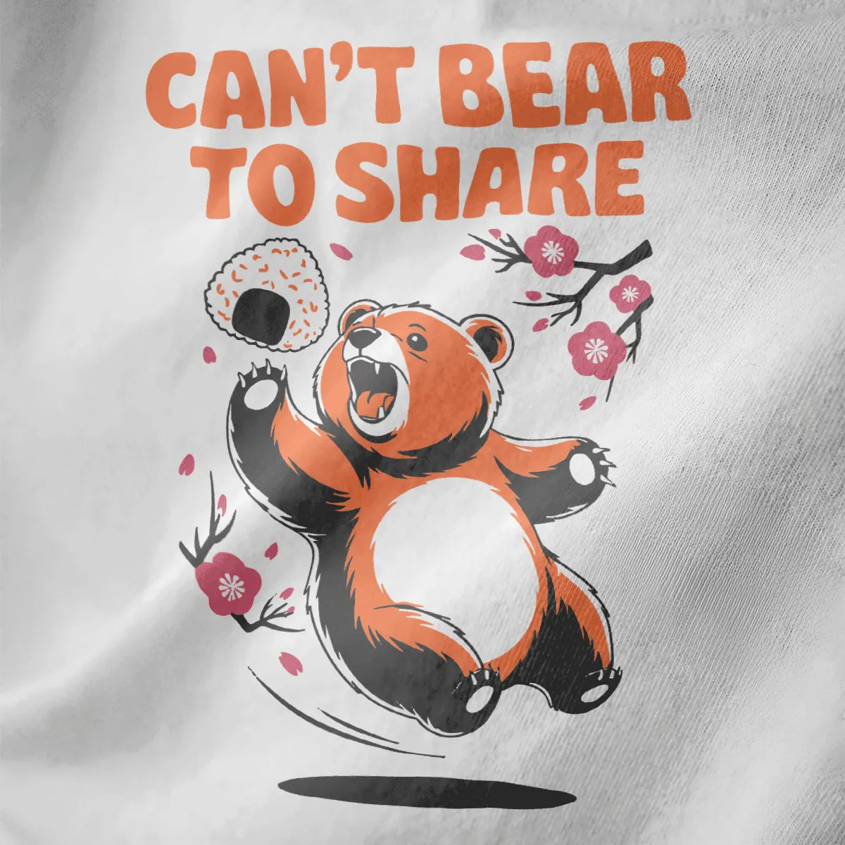 Close-up of playful bear holding rice ball with cherry blossoms on white t-shirt, bear shirt, kawaii clothes.