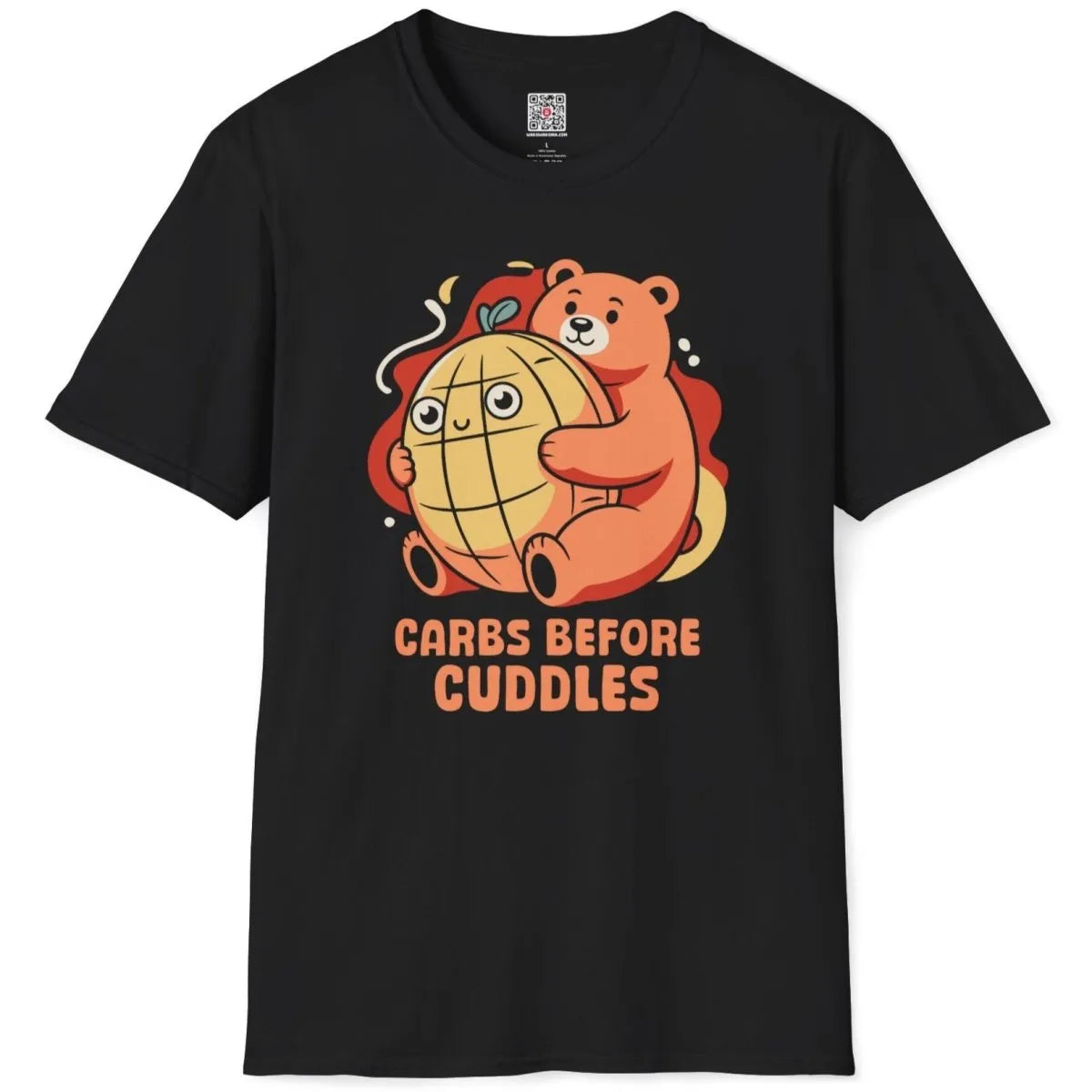 Black t-shirt flatlay, orange bear with melon pan, "CARBS BEFORE CUDDLES" text, junk food shirt, foodie style.