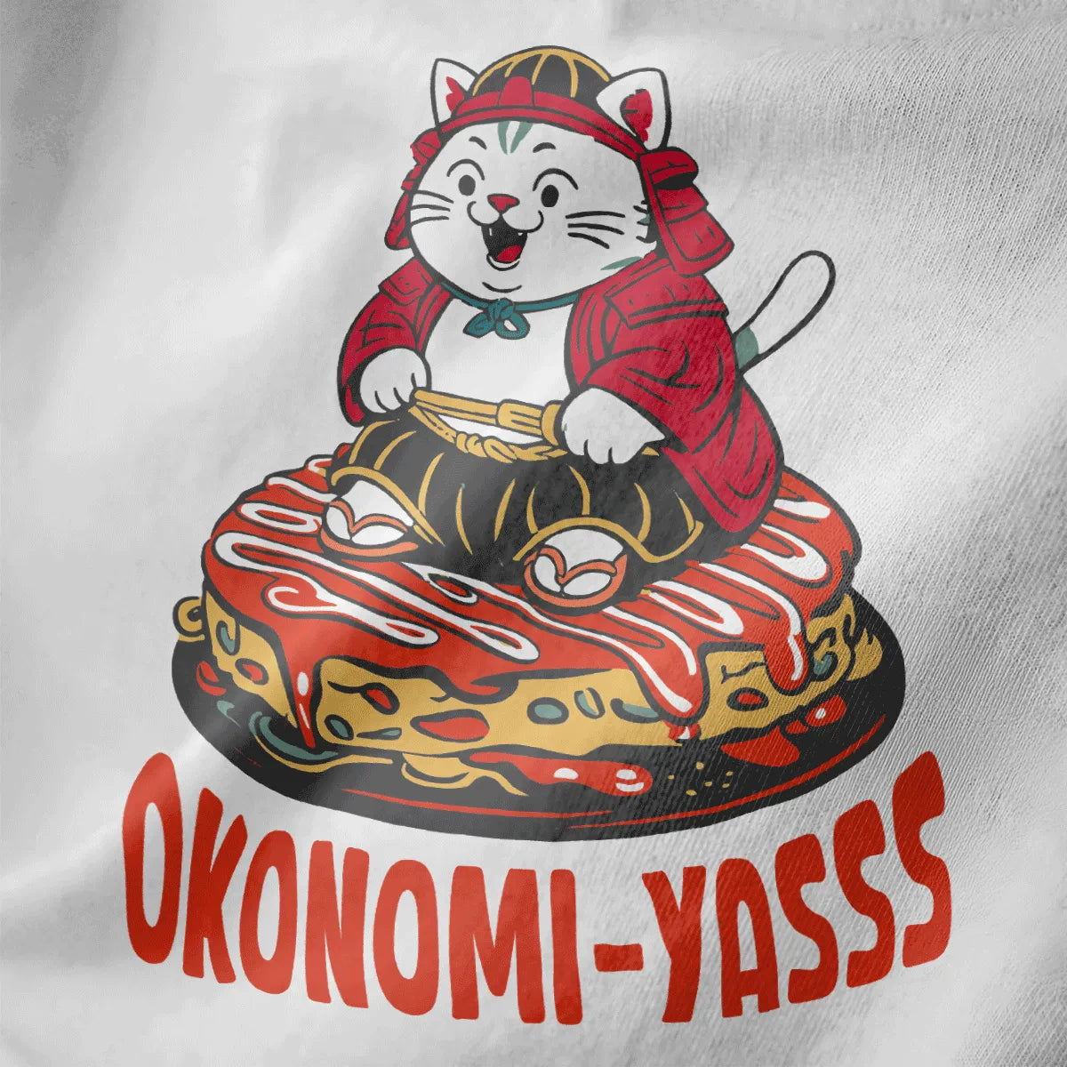 Playful samurai cat on okonomiyaki, white fabric close-up, with bold "OKONOMI-YASSS" text.