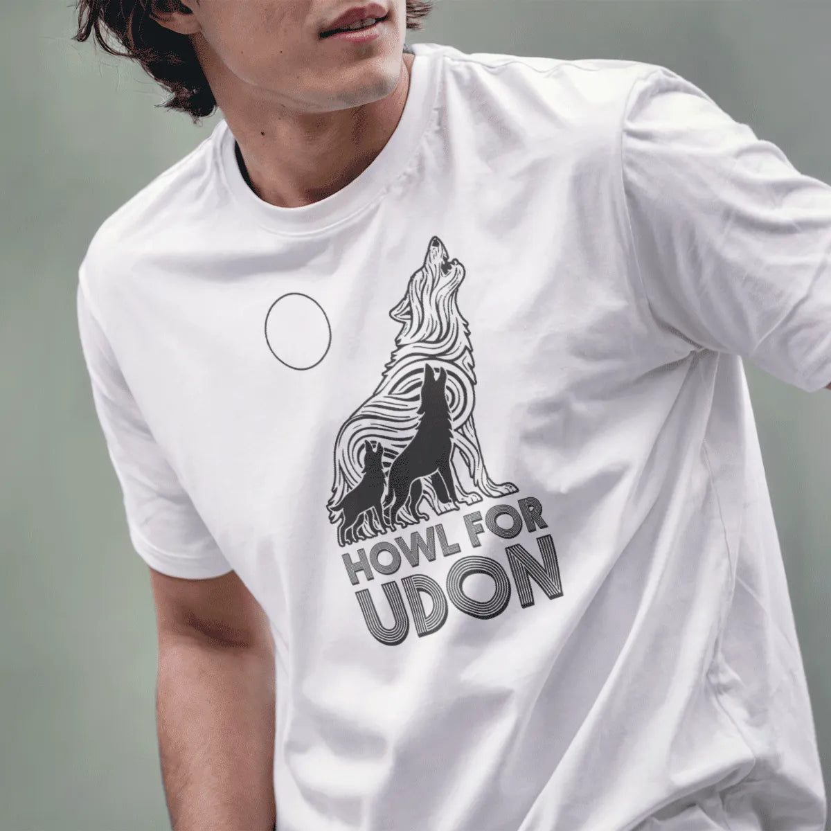 Male model in white t-shirt with three howling wolves and udon noodle wolf, bold typography, japanese t-shirts.