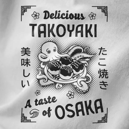White fabric close-up of a takoyaki t-shirt with octopus art, Japanese text, and vintage aesthetic details.