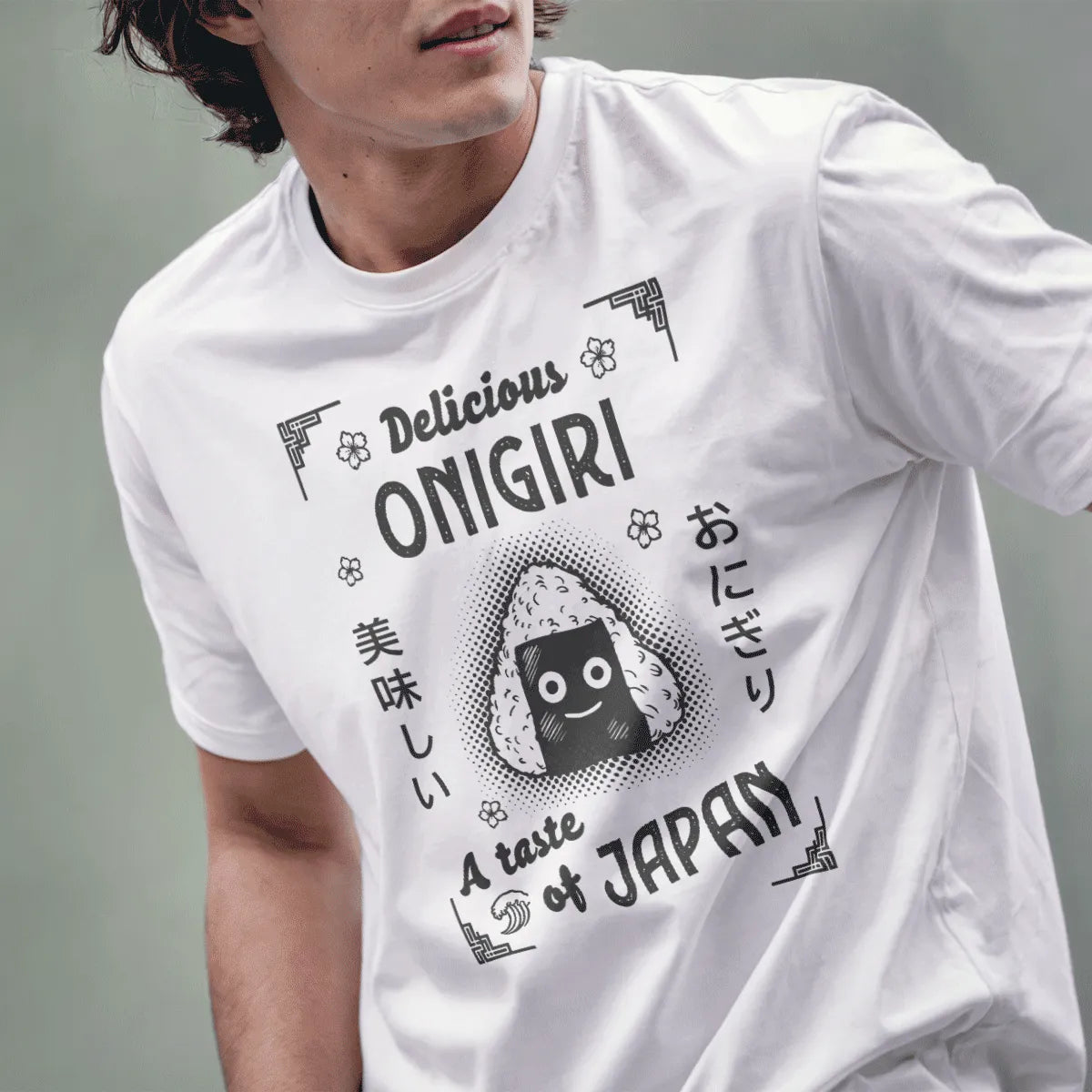Male model in white t-shirt with onigiri design, foodie style, japanese graphic tees.