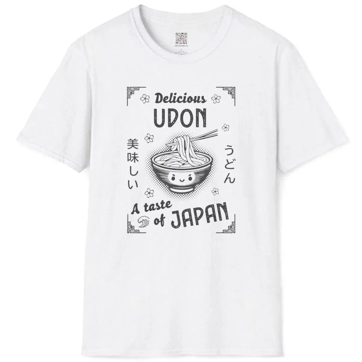 Flatlay of white t-shirt with charming udon bowl, floral details, and "A taste of JAPAN" phrase, foodie style.
