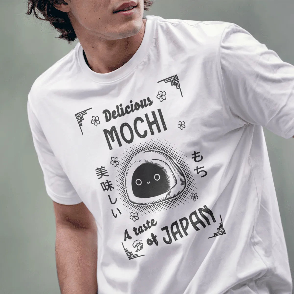 Male model in white tee with adorable mochi character and Japanese text, japan tee shirts, foodie style.