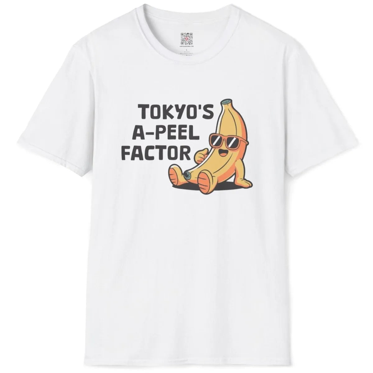 White flatlay t-shirt with cheerful banana, sunglasses, and bold text, tokyo banana.