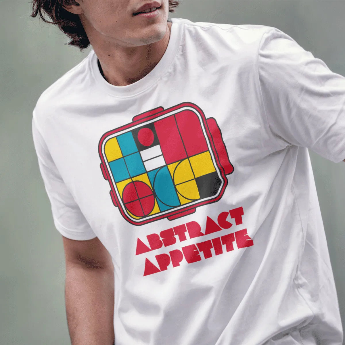 Male model in white t-shirt with abstract bento box, vibrant style, contemporary styling, japanese t-shirts.
