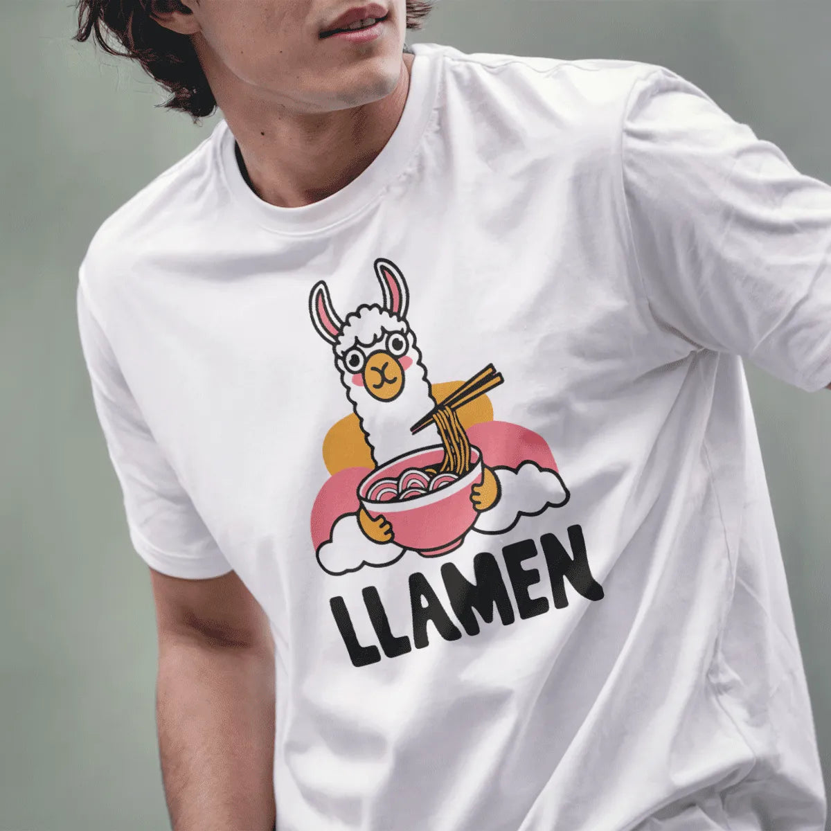 Male model wears white t-shirt with cartoon llama eating ramen, whimsical illustration, ramen t-shirt.