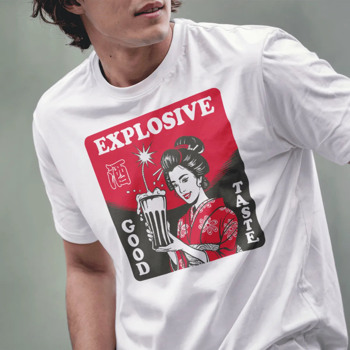 Male model in white t-shirt with geisha, sake cup, and EXPLOSIVE GOOD TASTE text, traditional japanese art.