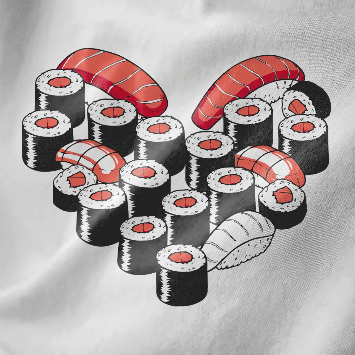 Close-up of sushi heart art on white fabric, featuring vibrant colors and sushi t-shirt design.
