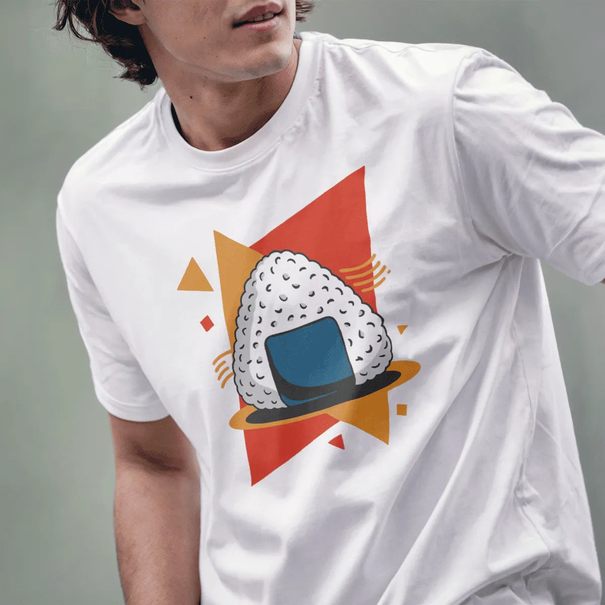 Male model wears white t-shirt with cartoon onigiri and abstract shapes, streetwear styles for men.