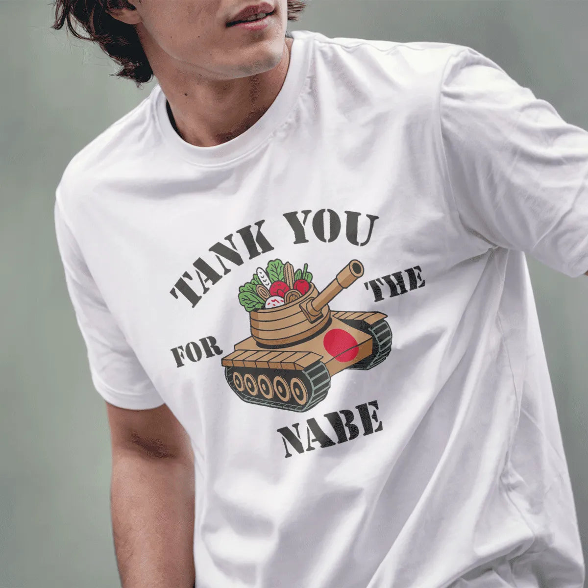 Male model in white t-shirt with cartoon tank, nabe pot, and humorous quote, military imagery, japanese t-shirts.
