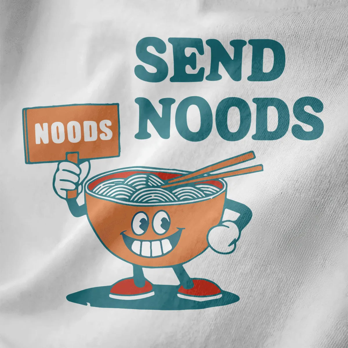 Closeup of playful cartoon noodle bowl with “SEND NOODS” text on white t-shirt, ramen t-shirt, whimsical illustration.