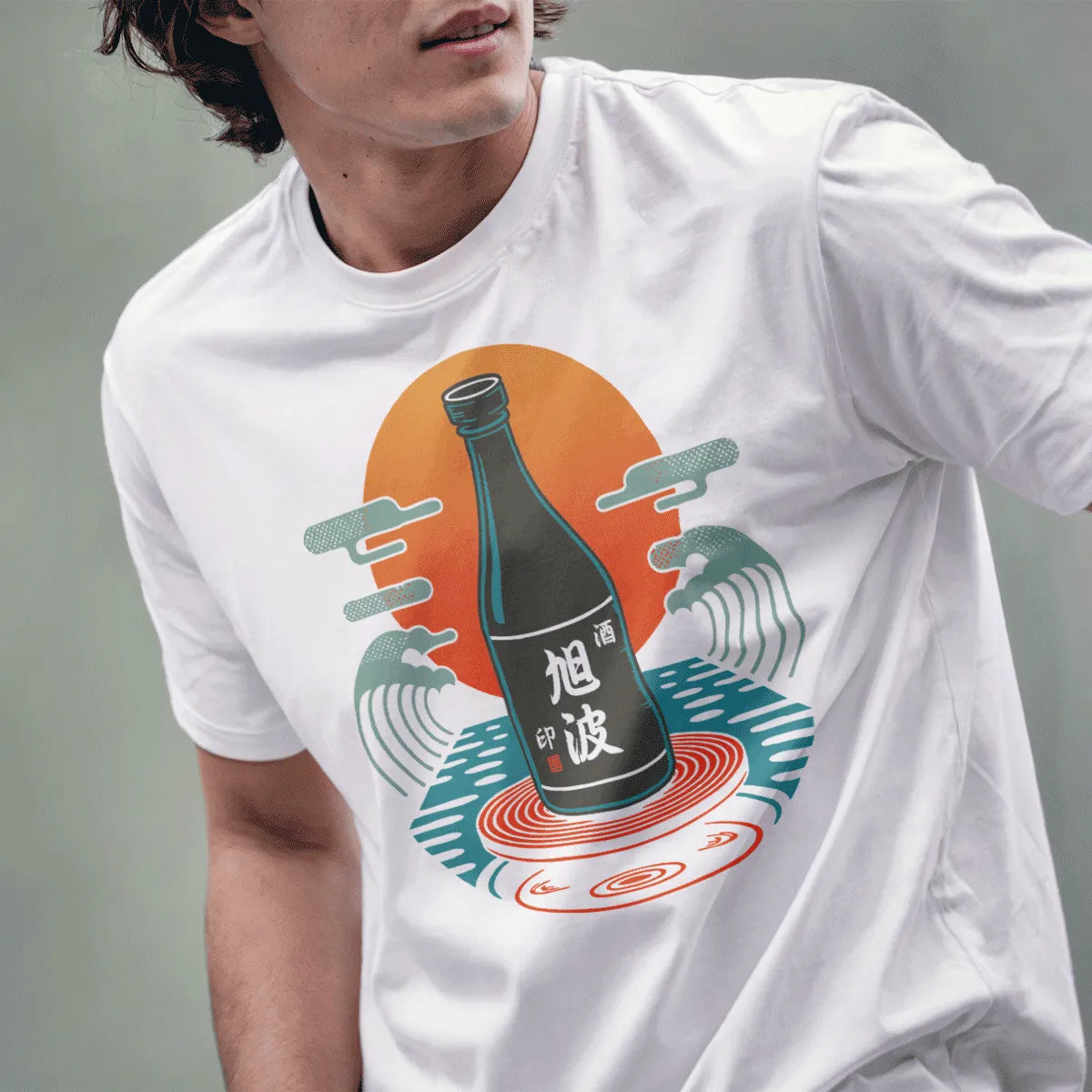 Male model wears white t-shirt featuring classic sake bottle, sunrise gradient, and peaceful wave design.
