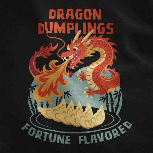 Black fabric close-up showing hand-drawn dragon art coiling above detailed gyoza dumplings and bamboo.