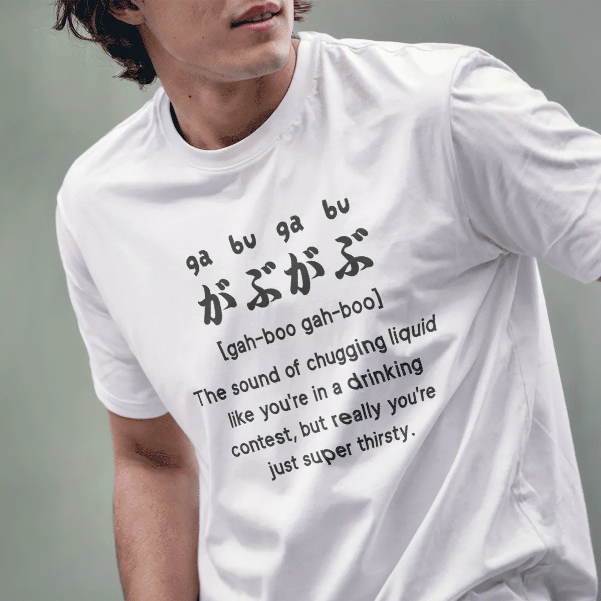 Male model in white t-shirt with "gabu-gabu" Japanese and English text, cool design for shirts, unisex t-shirt.
