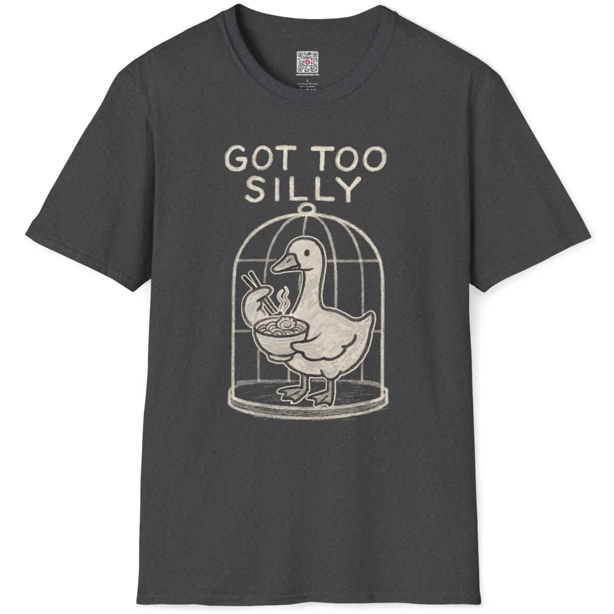 Lighthearted duck-in-cage scene with ramen and hand-drawn quote on dark heather t-shirt, flatlay.