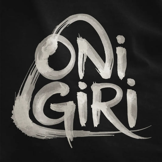 Bold "Onigiri" brushstroke text in varying gray shades on black fabric close-up.