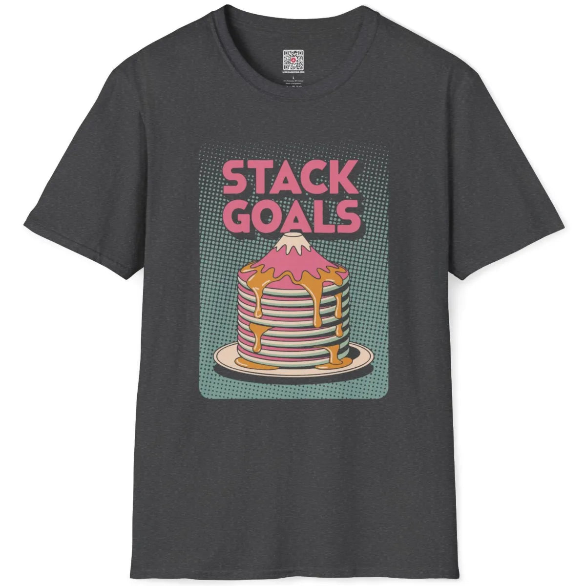 Dark heather flatlay showing whimsical Mount Fuji pancake stack with syrup and retro pop-art graphic text.