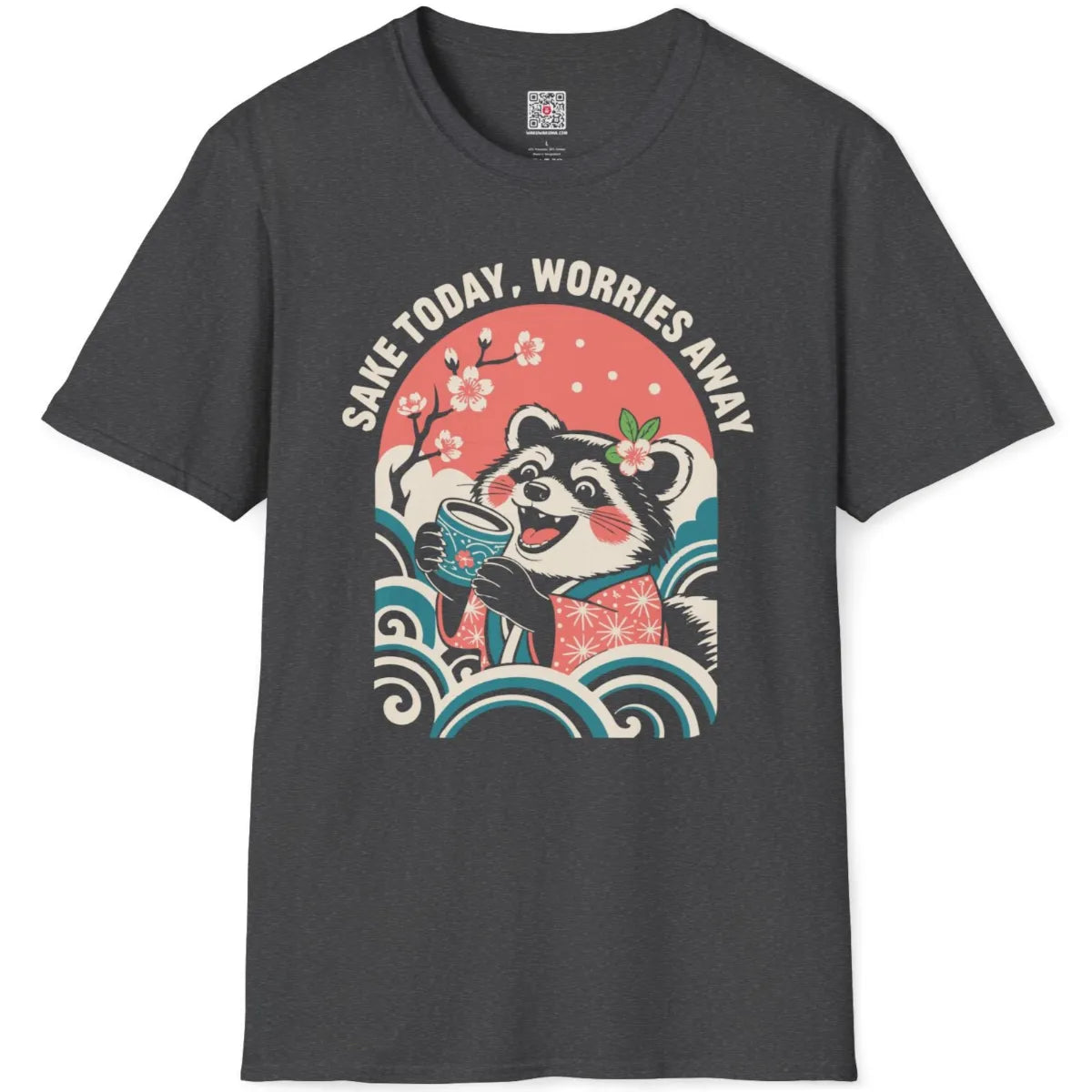 Dark heather tee flatlay with raccoon, cherry blossoms, "Sake Today, Worries Away" text, graphic shirt, pastel color.