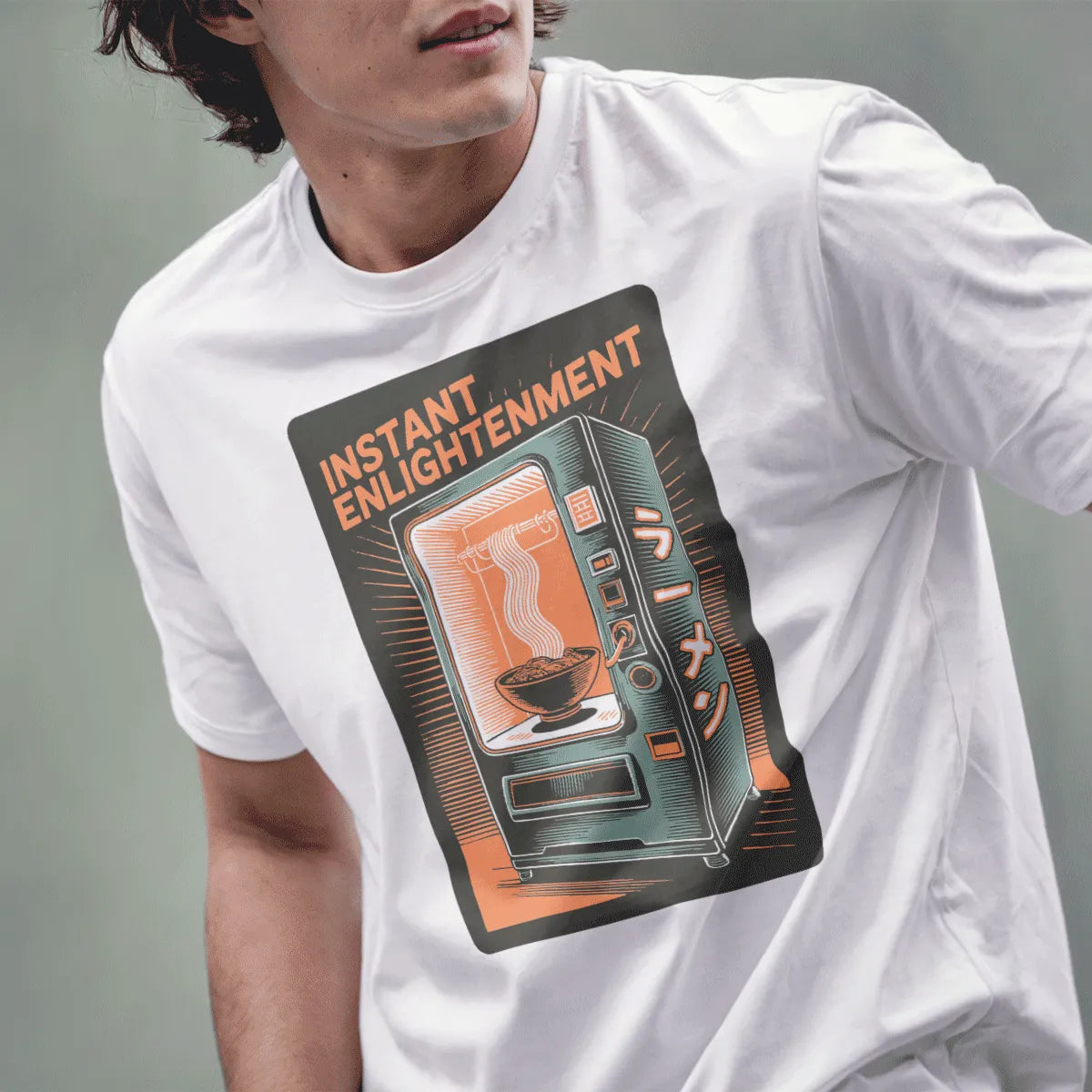 Male model wears white t-shirt with hand-drawn retro vending machine and steaming ramen bowl.