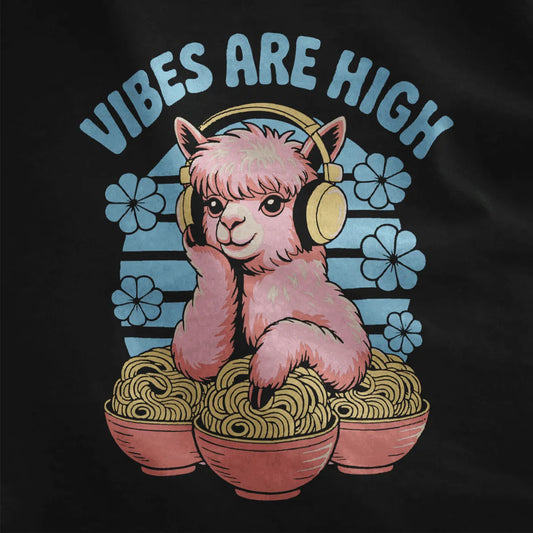 Pastel pink alpaca with yellow headphones and steaming ramen bowls on black fabric close-up.