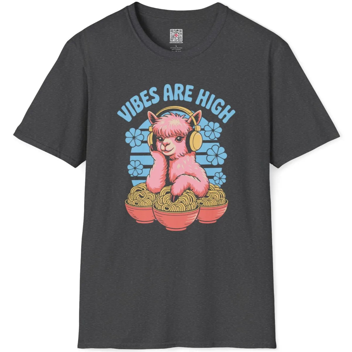 Dark heather flatlay t-shirt with whimsical pink alpaca wearing yellow headphones amid ramen bowls and blue flowers.