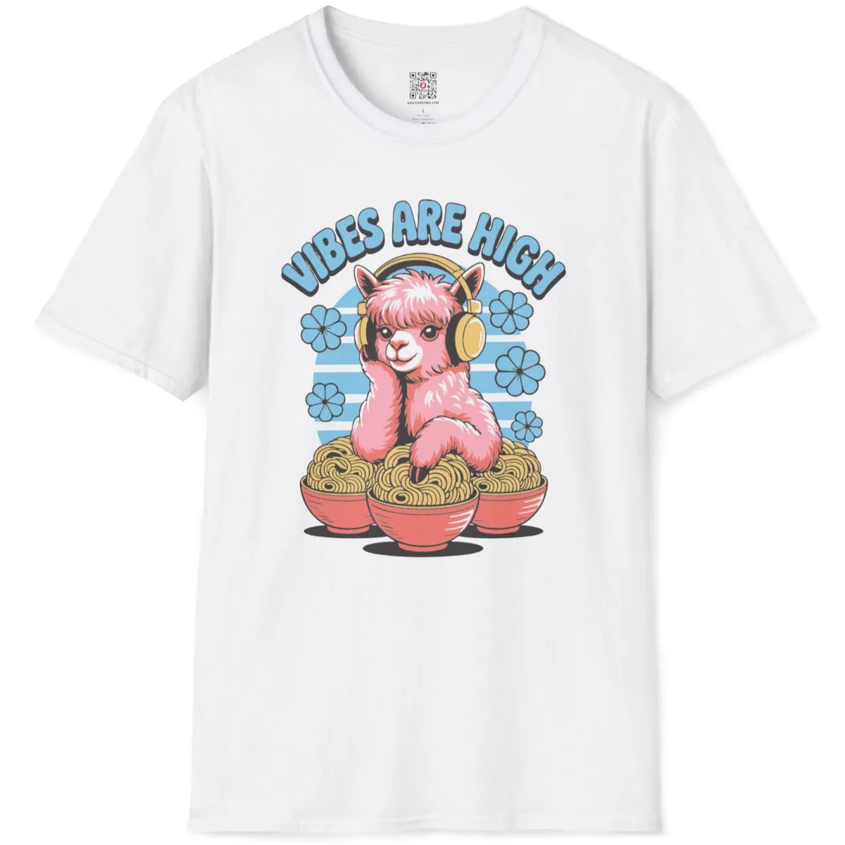 White flatlay tee featuring cartoonish pink alpaca with headphones, steaming ramen, and playful blue text arc.