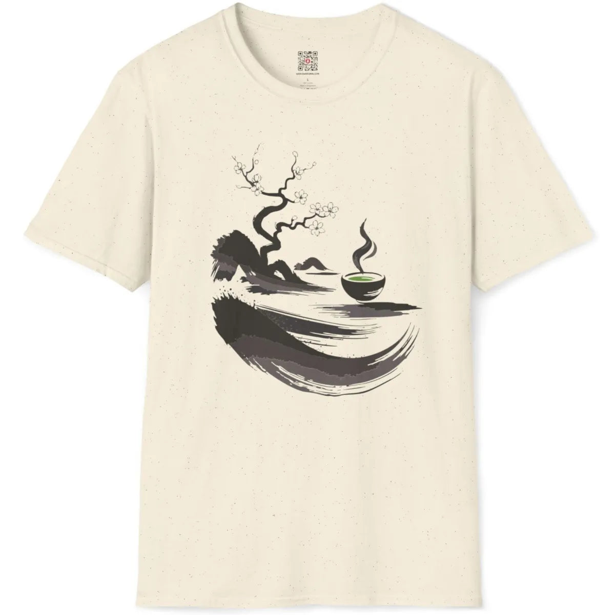 Natural fabric t-shirt flatlay displaying sumi-e twisted tree, spring cherry blossoms, and green matcha bowl.