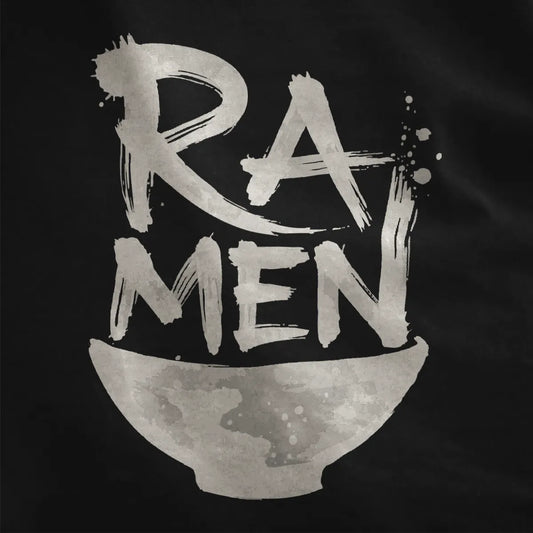 Detailed close-up of dark gray ceramic ramen bowl with black brushstroke "RAMEN" text on black fabric.