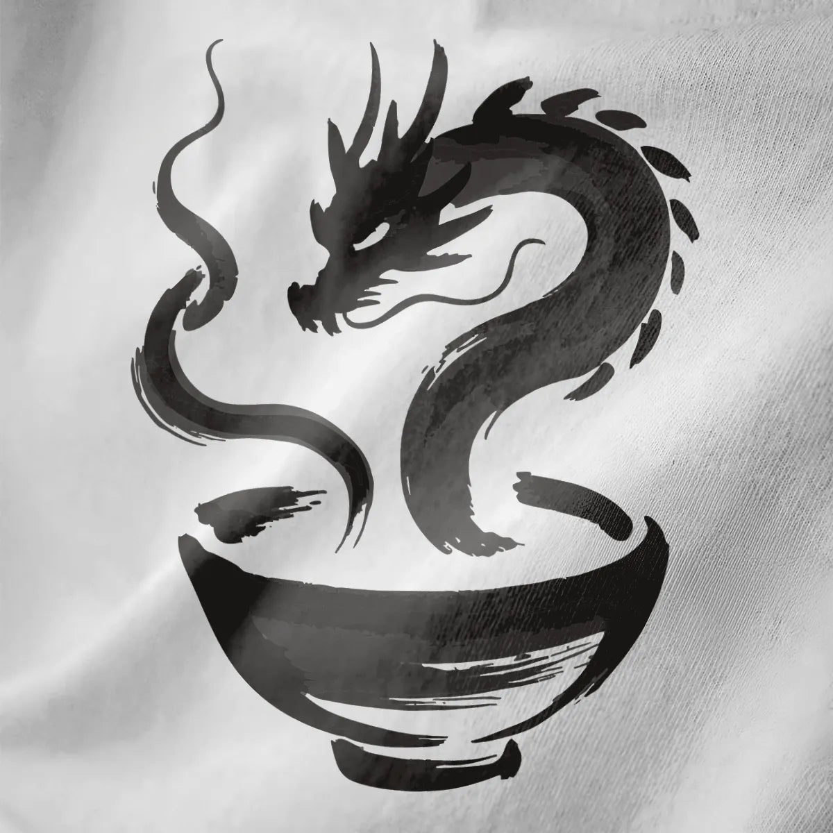 Close-up on white fabric showing brushstroke dragon rising from ramen bowl in monochrome palette.