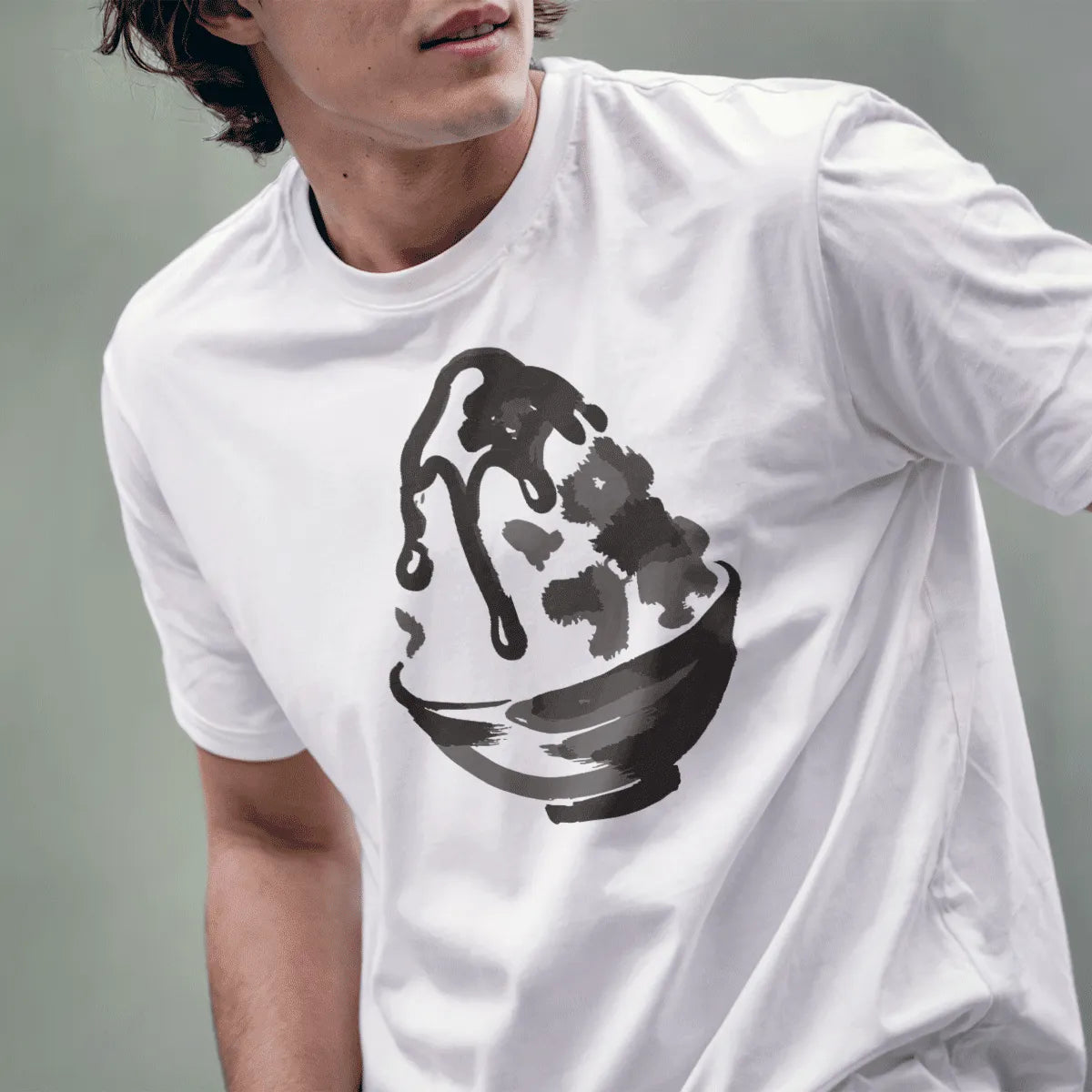 Male model wears white shirt featuring light and airy kakigori brushstroke design with high contrast art.