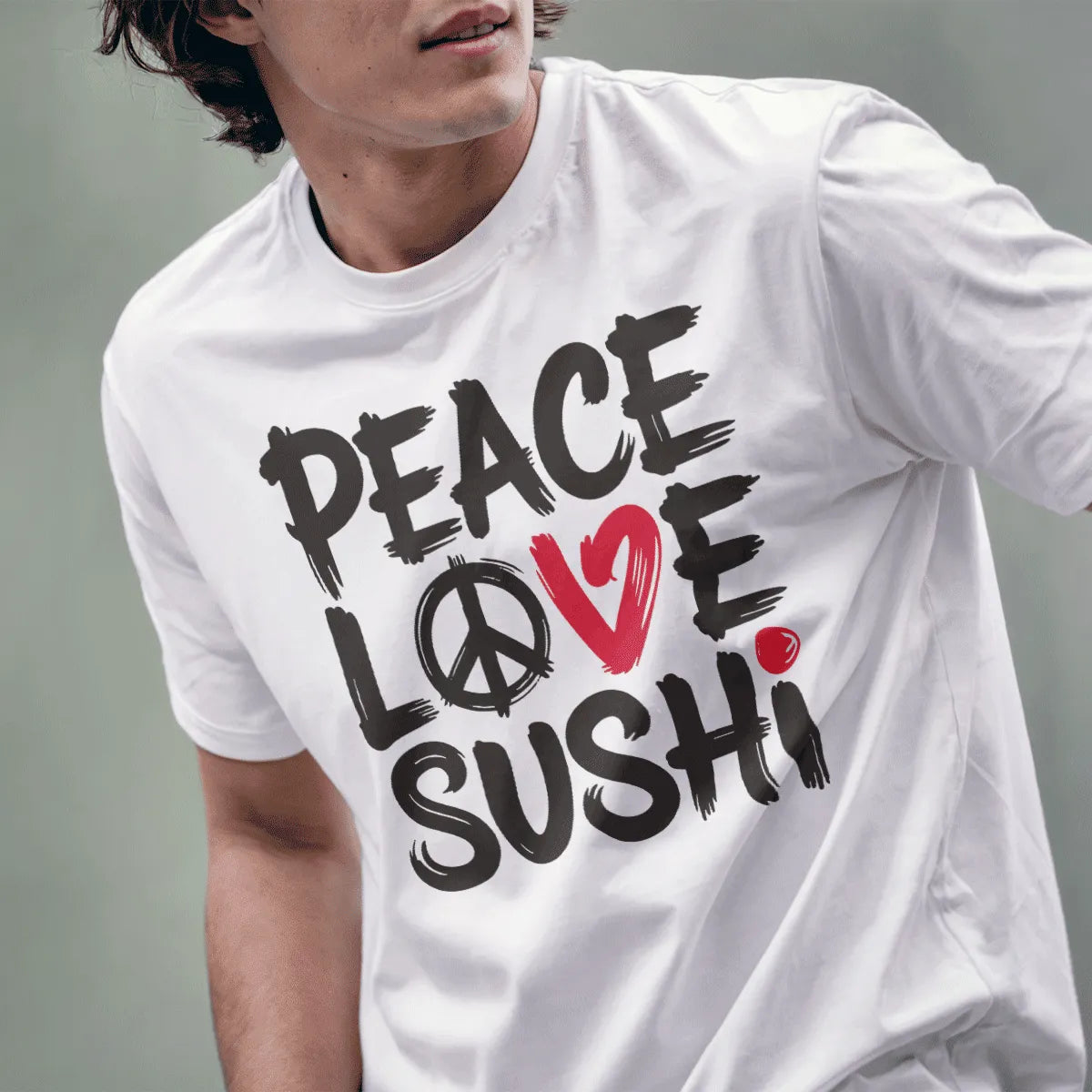 Male model wearing white t-shirt with black brushstroke "Peace, Love, Sushi" and red heart graphic visible.
